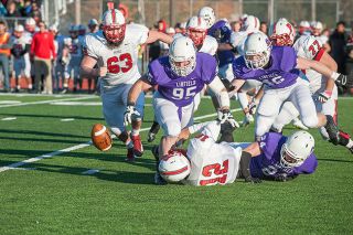 Rusty Rae/News-Register file photo##
In 2014, Pacific quarterback Warner Shaw (12) is sacked by Linfield’s Austin Lee (24) as Marq Randall (95) and Marcus
McGovern (46) scramble for the loose ball. Kevin Peterson (77) and Will Ulrich (63) look on for Pacific. Rusty Rae/News-Register file photo##
In 2014, Pacific quarterback Warner Shaw (12) is sacked by Linfield’s Austin Lee (24) as Marq Randall (95) and Marcus
McGovern (46) scramble for the loose ball. Kevin Peterson (77) and Will Ulrich (63) look on for Pacific.