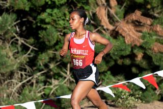 Marcus Larson/News-Register##After a successful freshman season, McMinnville freshman cross country runner Yemi Rue says she is eager improve.