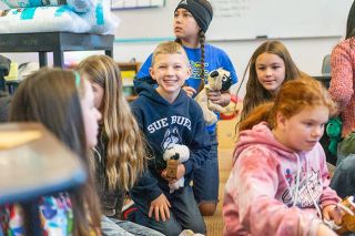 Rachel Thompson/News-Register##
Emmit Watson, center, and other Buel Elementary School leadership students are happy to be able to make stuffed animals for children who visit
Juliette’s House. It’s one of several service projects they’ll do this year as fifth-grade leaders.
