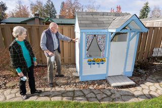 Marcus Larson/News-Register##Genne Sherman and her husband, Dick, discuss the long history of the playhouse Genne s grandfather built for her 6th birthday. Dick
restored the playhouse when their great-grandchildren were coming to visit their home in McMinnville.