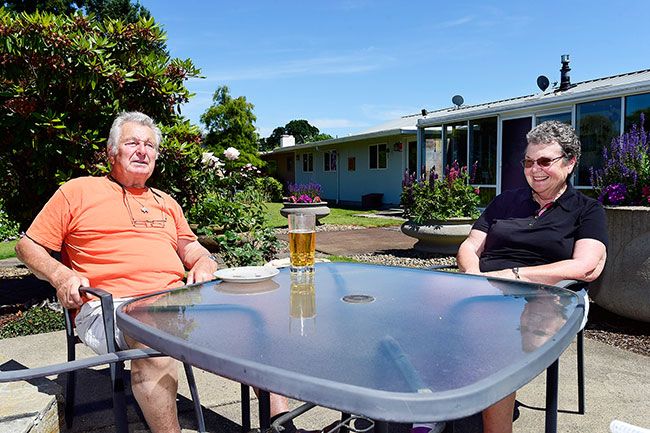 News-Register file photo ## George and Carolyn Stastny also are thankful to have a nice backyard in which to relax during warm weather.