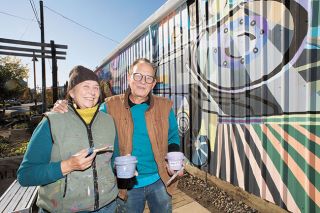 Rusty Rae/News-Register##Rounding the Bend” artists Angelina Marino-Heidel and Joel Heidel looked to their love of nature and their family history in the region, in creating the
new mural on Alpine Avenue, which is McMinnville’s latest such large artwork