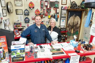 Marcus Larson/News-Register
##John and Cinda Rima are surrounded by memorabilia, awards and products during their final days at the front desk of John s Mower Hospital. They’ve been cleaning out their 11th Street headquarters in anticipation of John’s retirement at the end of the year. Marcus Larson/News-Register
##John and Cinda Rima are surrounded by memorabilia, awards and products during their final days at the front desk of John s Mower Hospital. They’ve been cleaning out their 11th Street headquarters in anticipation of John’s retirement at the end of the year.