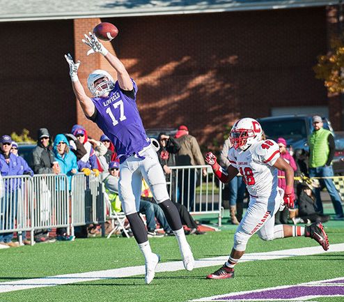 Marcus Larson/News-Register
Linfield Tight End Levi Altringer reaches up in the back of the endzone to make the catch for a touchdown.