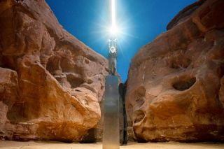Submitted image by Ross Bernards##Photographer Ross Bernards asked a friend to climb atop the mysterious Utah monument for this spectacular shot on Nov. 27, a few minutes before the structure was dismantled by a group wanting to keep the desert location pristine. Submitted image by Ross Bernards##Photographer Ross Bernards asked a friend to climb atop the mysterious Utah monument for this spectacular shot on Nov. 27, a few minutes before the structure was dismantled by a group wanting to keep the desert location pristine.