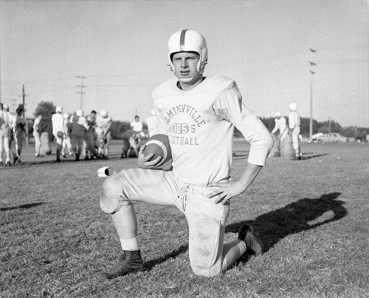 News-Register file photo##Perry Stubberfield, a senior at the time, poses for a photo run in the Nov. 3, 1955, issue of the News-Register, as the Grizzlies prepared for a playoff game against Gresham. The photo ran with this caption: “When Gresham’s Gophers draw up their final battle plans for the Mac High Bruins November 11, the lad pictured here will figure prominently in their blueprints, for this is Perry Stubberfield, the fine field general for the Grizzlies. The 190-pound passing star could give the Gresham crew a lot of trouble if he decides to take to the air.”