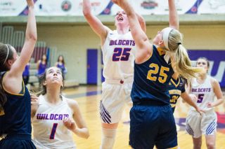 Marcus Larson/News-Register##
Linfield senior center Molly Danielson shoots the game-winning shot during Tuesday’s 63-61 Wildcat win. Marcus Larson/News-Register##
Linfield senior center Molly Danielson shoots the game-winning shot during Tuesday’s 63-61 Wildcat win.