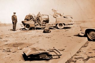 Image: portlandcrime.blogspot.com##The wreckage of Oliver Kermit Smith’s car after it was blown to pieces by explosives in the parking lot of the Columbia Edgewater Country Club. Picture is from the files of Det. Walter Graven.