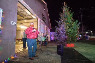 Marcus Larson/News-Register##Amity Mayor Michael Cape addresses residents after lighting the town’s Christmas tree earlier this month. Cape didn’t run for reelection this year and attended his final city council meeting as mayor on Dec. 2.