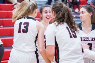 Marcus Larson/News-Register##
Grace Bliven celebrates with teammates Gretchen Sorenson (13) and Kylee Arzner (15) following her clutch shot. Marcus Larson/News-Register##
Grace Bliven celebrates with teammates Gretchen Sorenson (13) and Kylee Arzner (15) following her clutch shot.