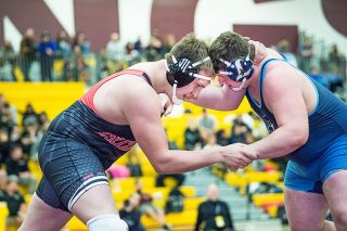 Marcus Larson/News-Register file photo##
McMinnville varsity heavyweight wrestler Jacob Barnes, seen during last year’s district meet, returns to lead the Grizzlies during the 2019-20 season. Marcus Larson/News-Register file photo##
McMinnville varsity heavyweight wrestler Jacob Barnes, seen during last year’s district meet, returns to lead the Grizzlies during the 2019-20 season.