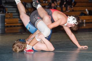 Rusty Rae/News-Register##
Jeremiah Lent, the Grizzlies’ 170-pound wrestler grapples with a Liberty wrestler during last Thursday’s dual meet. Lent eventually prevailed with a 9-7 decision. Rusty Rae/News-Register##
Jeremiah Lent, the Grizzlies’ 170-pound wrestler grapples with a Liberty wrestler during last Thursday’s dual meet. Lent eventually prevailed with a 9-7 decision.