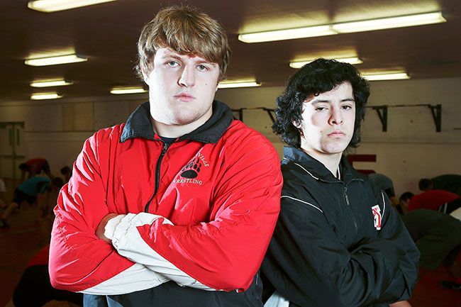 Rockne Roll/News-Register##
McMinnville wrestlers Brian Barnes, left, and Michael Abeyta, will lead the team this year as they look to compete at state.