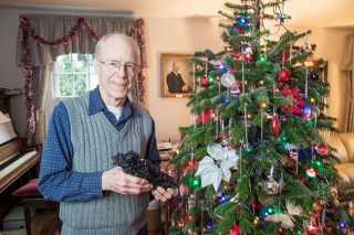 Rusty Rae/News-Register
Mike Rice smiles while holding the engine for his 1953 Lionel train set. The set has been a part of his Christmas tradition for many years. Rusty Rae/News-Register
Mike Rice smiles while holding the engine for his 1953 Lionel train set. The set has been a part of his Christmas tradition for many years.