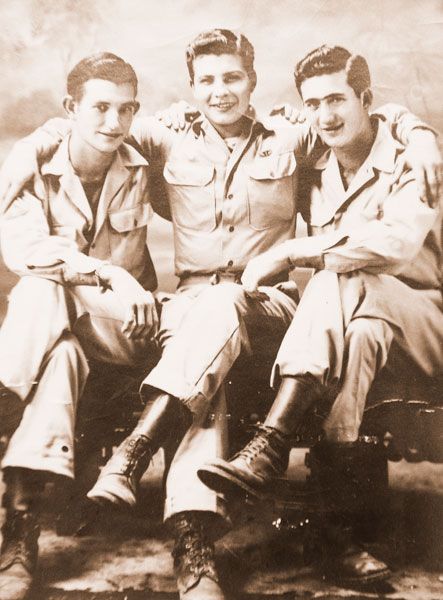 Submitted photo##
> Ralph Juda, center, and two of his buddies during World War II.