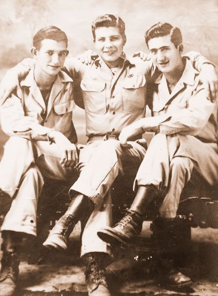 Submitted photo##
> Ralph Juda, center, and two of his buddies during World War II.