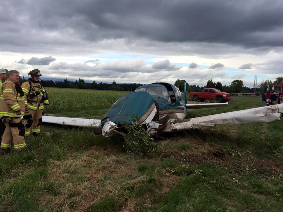 Photo courtesy McMinnville Fire Department##Two Seattle-area men sustained minor injuries when the plan they were occupying crashed Monday night in the area of Lafayette Highway and Leach Lane.