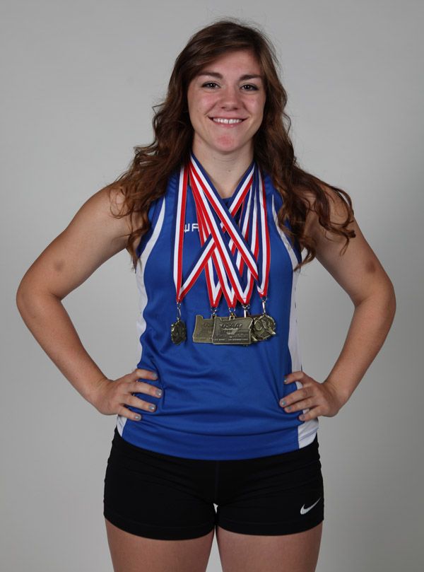Rockne Roll/News-Register file##
In this Monday, June 22, 2015 file photo, Lindsay McShane is pictured with medals from 2015 district and state track and field championship competitions. McShane will join the track program at Oregon State University next year.