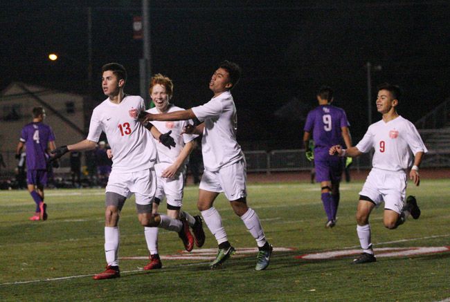 Rockne Roll/News-Register##
Cameron Autencio (13) celebrates his second goal of the night as McMinnville defeated South Eugene 3-0 at Wortman Stadium on Tuesday.