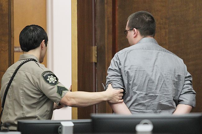 Rockne Roll/News-Register##
Jeremy Hopper II is  escorted out of a Yamhill County circuit courtroom by sheriff s Sgt. Jeremy Ruby after the guilty verdict was read in Hopper s manslaughter trial Monday at the Yamhill County Courthouse.
