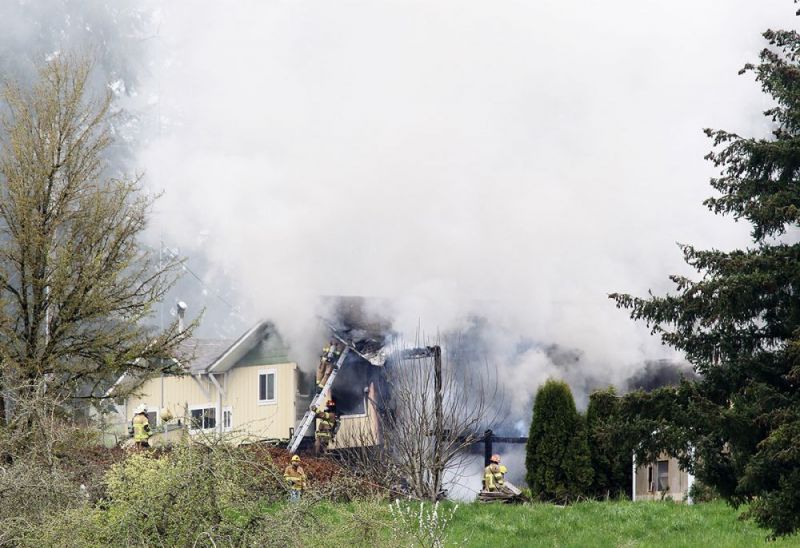 Rockne Roll/News-Register##
Firefighters from multiple agencies respond to a house fire along Lafayette Highway north of Hopewell Wednesday afternoon.