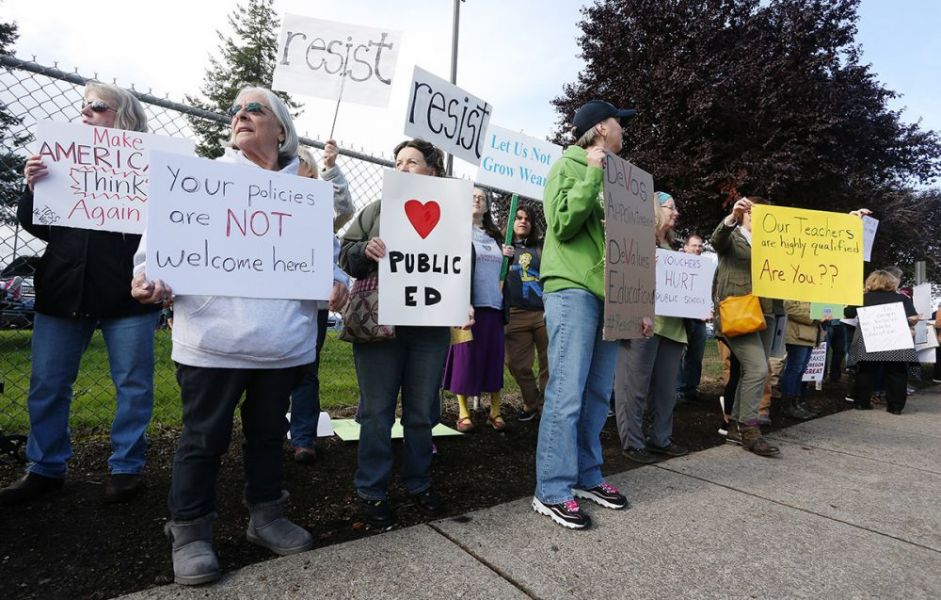 Rockne Roll/News-Register##
Protestors demonstrate outside McMinnville  High School during education secretary Betsy DeVos  visit to the school Wednesday, Oct. 11.