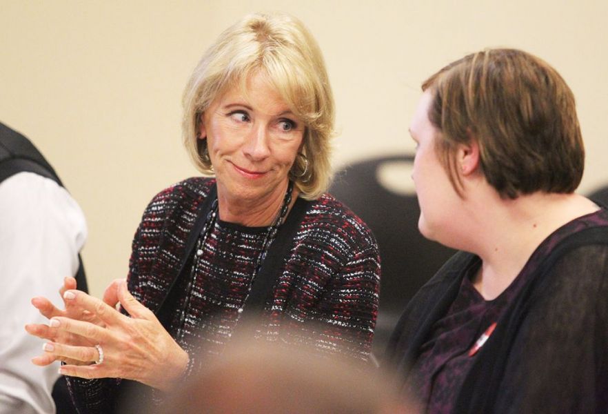 Rockne Roll/News-Register##
Education secretary Betsy DeVos and McMinnville High School teacher Audrey Wright discuss teaching methodology during DeVos  visit to the school Wednesday, Oct. 11.