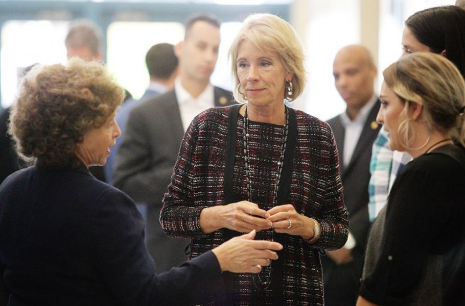 Rockne Roll/News-Register##
Education secretary Betsy DeVos talks with McMinnville School District Superintendent Maryalice Russell, left, and McMinnville High School Assistant Principal Amy Fast, right, during her visit to the school Wednesday, Oct. 11.