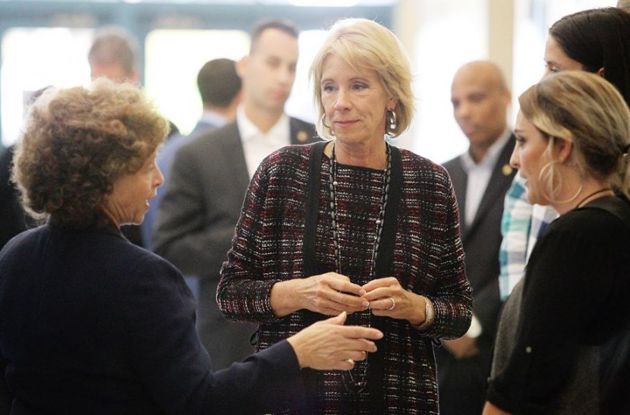 Rockne Roll/News-Register##
Education secretary Betsy DeVos talks with McMinnville School District Superintendent Maryalice Russell, left, and McMinnville High School Assistant Principal Amy Fast, right, during her visit to the school Wednesday, Oct. 11.