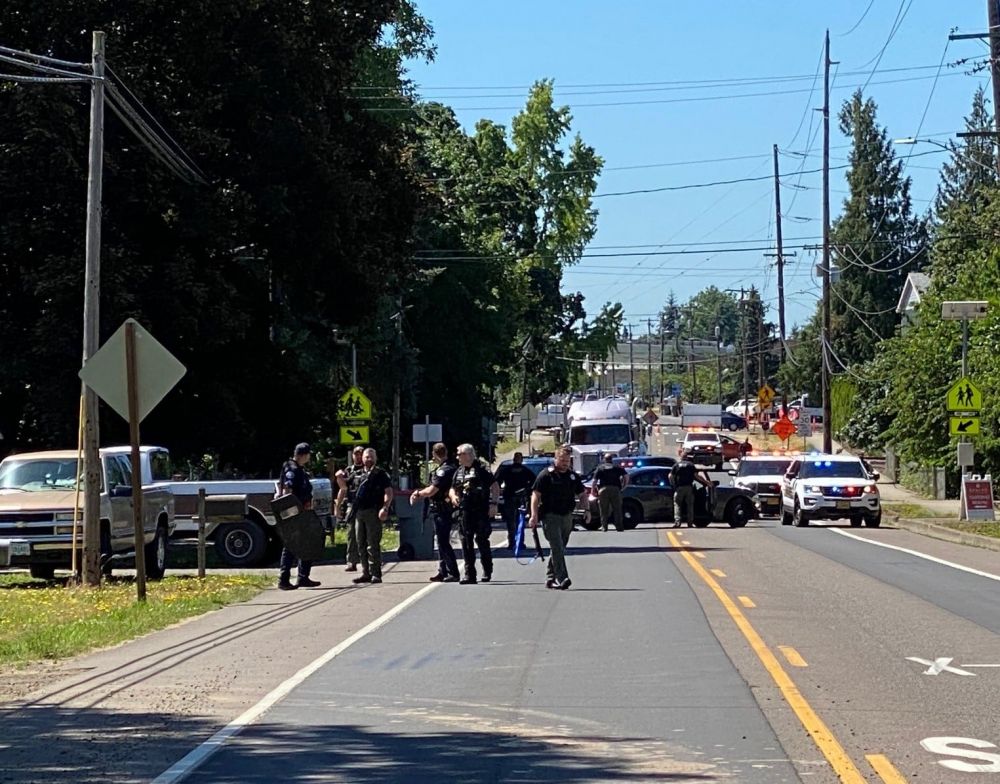 Photo courtesy Yamhill County Sheriff s Office@@Law enforcement personnel converge upon the North Trade Street (Highway 99W) area of Amity Wednesday afternoon to resolve a disturbance at a residence. An arrest was made.