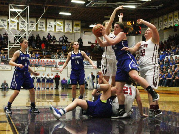 Rockne Roll/News-Register##
Lindsay McShane (32) of Amity corrals a rebound in the OSAA Class 3A State Championship Game against Dayton at the Pirate Palace in Coos Bay on Saturday, March 5.