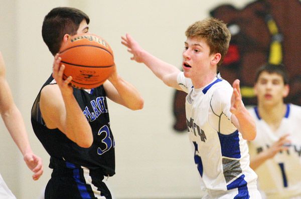 Rockne Roll/News-Register##
Amity s Kolton Rohde defends Blanchet Catholic s Nick Conway in Friday s consolation semifinal between the schools in North Bend.