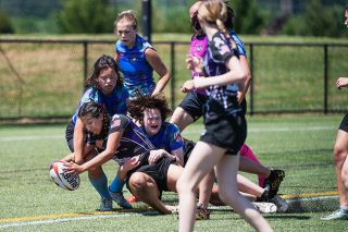 Rusty Rae/News-Register##Merary Ulloa-Uribe extends and puts the ball down to score a try during the second half of the Rugby Oregon state title game. Ulloa-Uribe was one of the best players for the Panthers this season, helping guide them to a 7-2 record.