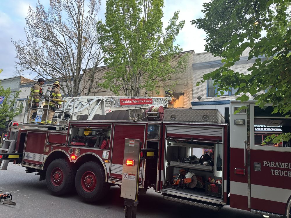 Submitted photo##Firefighters work to control a fire at the building at Third and Evans streets that houses 3rd Street Pizza and the Moonlight Theater Wednesday morning.