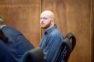 Rusty Rae/News-Register##Dillan Cashman awaits the start of his attempted aggravated murder trial Monday morning in Yamhill County Circuit Court. The proceeding entered its fourth day Thursday morning, and is scheduled to continue through today but could extend into next week.