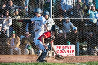 Rusty Rae/News-Register##Ida B. Wells’ Lucas Legare scores the winning run, capping a four-run seventh inning rally that eliminated McMinnville from the postseason.