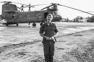 Photo courtesy of Steele Clayton##Steele Clayton poses in front of his Chinook helicopter during a lull in the action during his tour of duty in Vietnam.