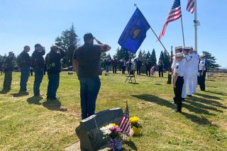 Starla Pointer/News-Register##American Legion Riders, Naval Sea Cadets and members of the American Legion, Legion Auxiliary and Sons of the Legion stand at attention during “Taps” in a ceremony at the Yamhill-Carlton Pioneer Cemetery on Memorial Day.