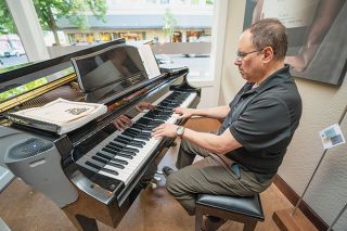 Rachel Thompson/News-Register##Jazz pianist Dana Libonati performs in the Willamette Valley Vineyards tasting room on Third Street. He’ll use an electronic keyboard when he plays on the US Bank Plaza during Taste of Mac on Saturday, June 10.