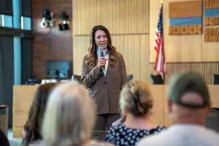 Rachel Thompson/News-Register##District 24 Rep. Lucetta Elmer answers a question from a McMinnville resident during Monday’s Town Hall at Kent Taylor Civic Center. Elmer detailed trials and successes of her first session as a representative and took questions.