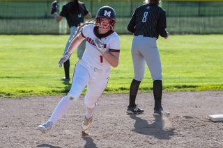 News-Register file photo##Madelyn Powell, pictured here in a 2022 McMinnville game, won one of the inaugural NAIA Gold Glove Awards after posting a .980 fielding percentage in 50 games for the College of Idaho.