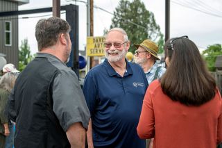 Rusty Rae/News-Register##McMinnville native and mechanic Dave Williams greets friends and customers — who are also friends — during a retirement party June 9. Williams is retiring after working on cars professionally for 50 years.