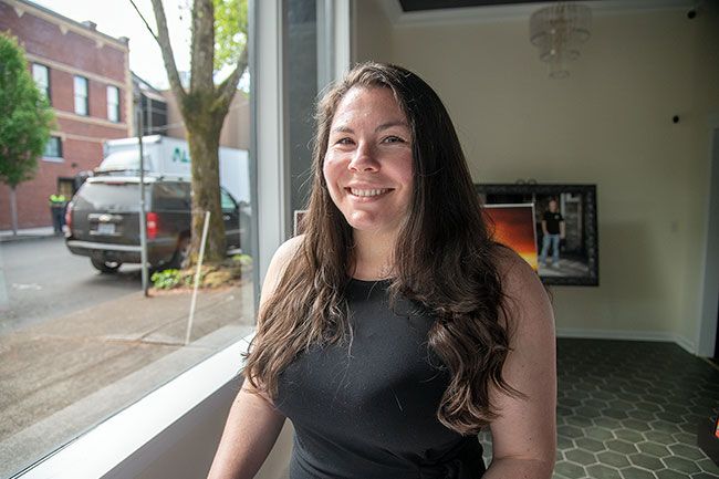 Rusty Rae/News-Register##Project manager Stephanie Miller said she is gaining experience as she helps open the new wine bar. Miller recently completed her master s degree in business at Linfield.