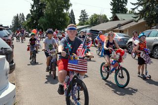 News-Register file photo: Youth will gather at Wascher Elementary in Lafayette at 9:30 to decorate their bikes before peddling through the annual parade starting at 10:30 p.m.
