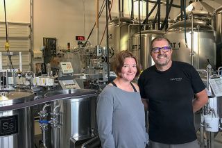 Kirby Neumann-Rea/News-Register##Rebecca and Josh Gordon purchased Evasion Brewing, located in north McMinnville. The brewery is one of two in McMinnville producing gluten-free beer, along with Bierly Brewing.