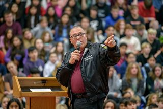 Rusty Rae/News-Register##Barry Brown, who served in the military from 1969 to 2010, tells Duniway Middle School students about his work as a helicopter pilot. He flew a rescue evacuation chopper in Vietnam and later helped with rescues on Mount Hood.