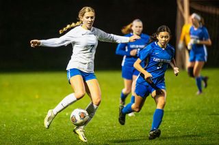 Rusty Rae/News-Register file photo##Amity sophomore striker Eliza Nisly controls the ball in the team’s semifinal matchup against Catlin Gabel.