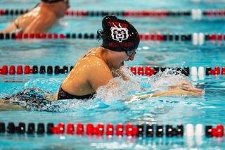Rusty Rae/News-Register##McMinnville freshman Emma Khoury took second place in the 100-yard breaststroke against Newberg.