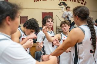 Rachel Thompson/News-Register##Led by Cohen Haller (center left) and Dylan Graham (center right), Willamina downed Yamhill Carlton at the Dayton Holiday Tournament. The Bulldogs went 3-0 at the tournament.