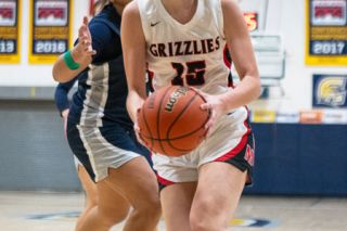 Rusty Rae/News-Register##McMinnville senior Maddy Gerhart led her team in scoring against Wilsonville with 18 points and was named the Player of the Game.